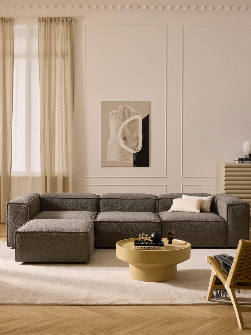 Modulares Sofa Lennon (4-Sitzer) aus Bouclé mit Hocker (links/rechts)