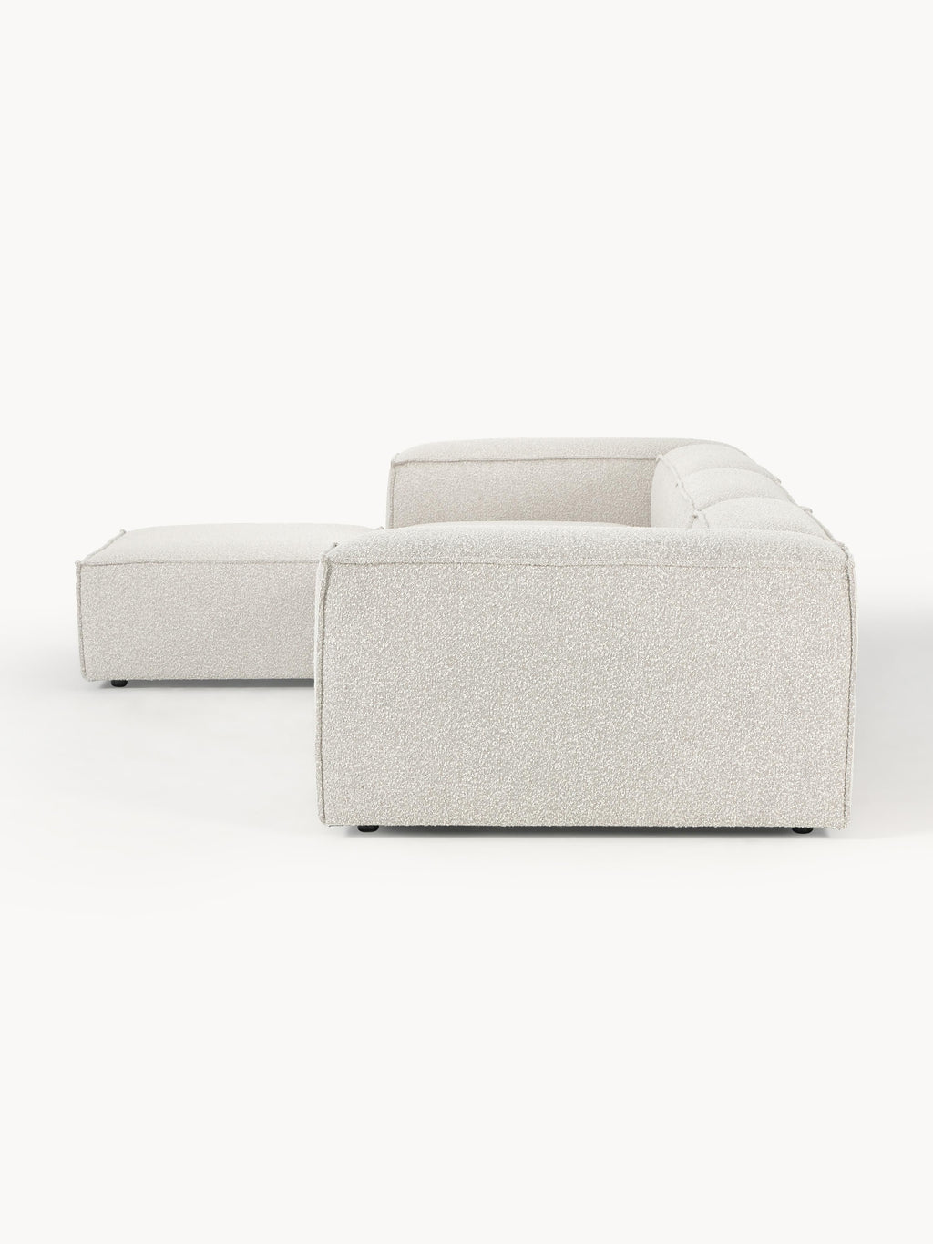 Modulares Sofa Lennon (4-Sitzer) aus Bouclé mit Hocker (links/rechts)