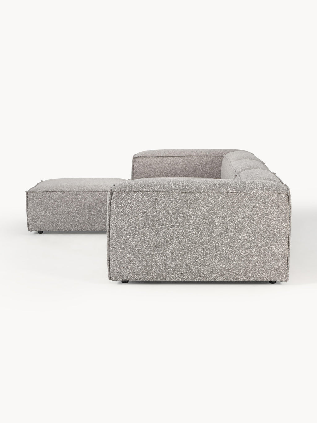 Modulares Sofa Lennon (4-Sitzer) aus Bouclé mit Hocker (links/rechts)
