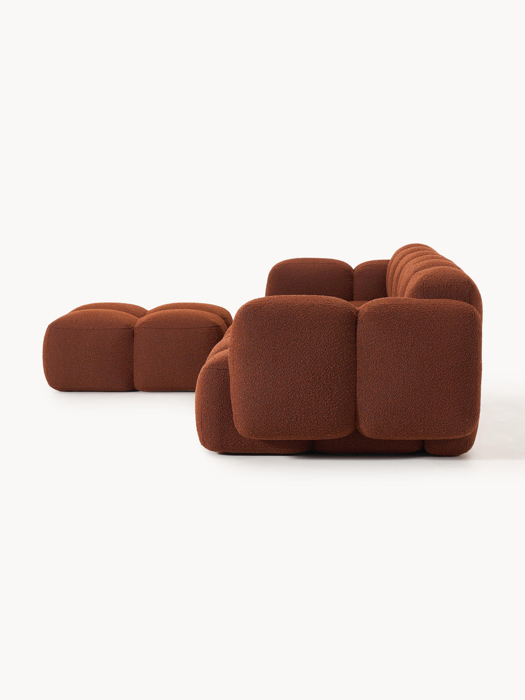 Modulares Sofa Tayla (4-Sitzer) aus Bouclé mit Hocker (links/rechts)