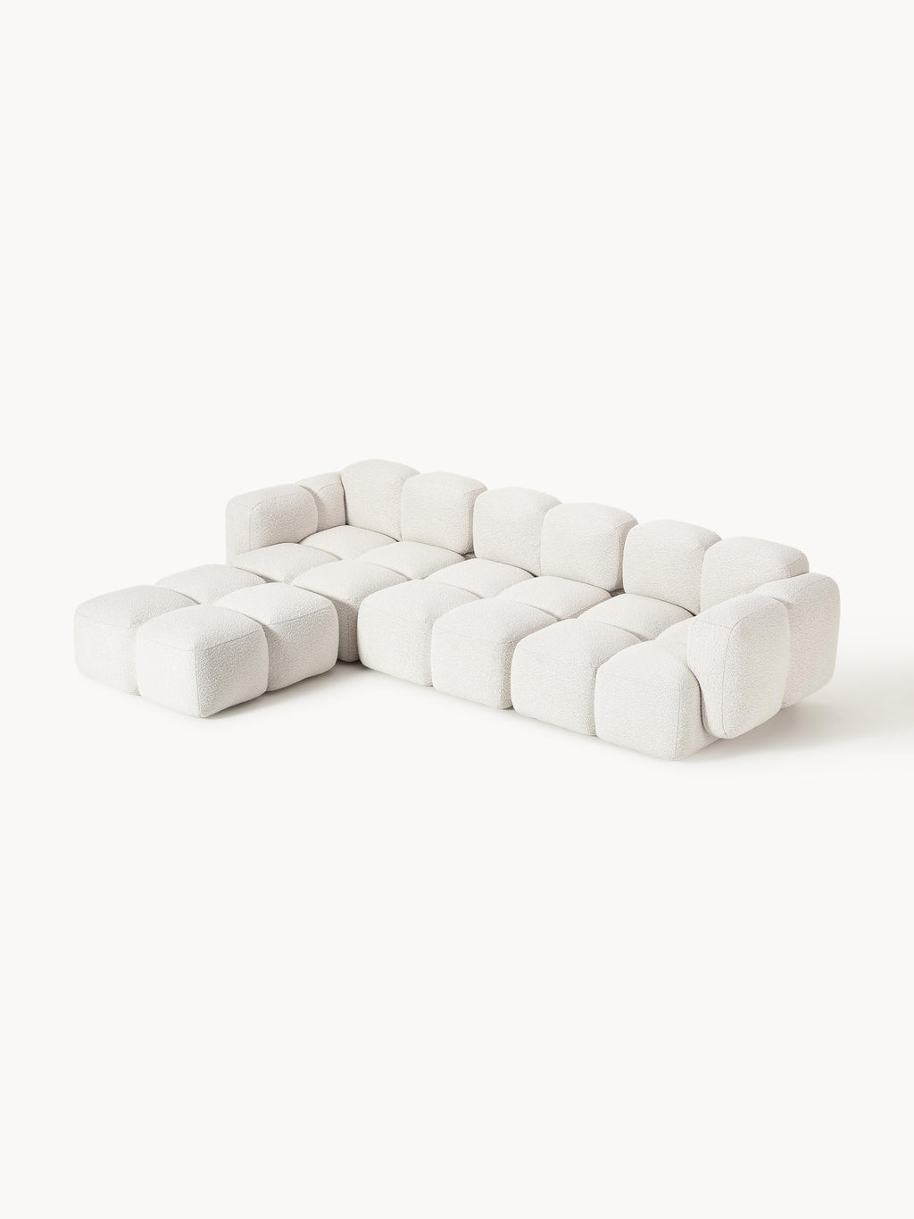 Modulares Sofa Tayla (4-Sitzer) aus Bouclé mit Hocker (links/rechts)