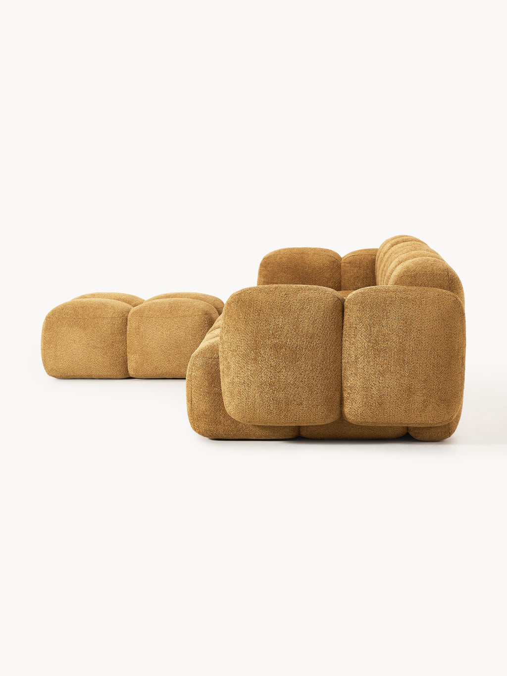 Modulares Sofa Tayla (4-Sitzer) aus Teddy-Bouclé mit Hocker (links/rechts)