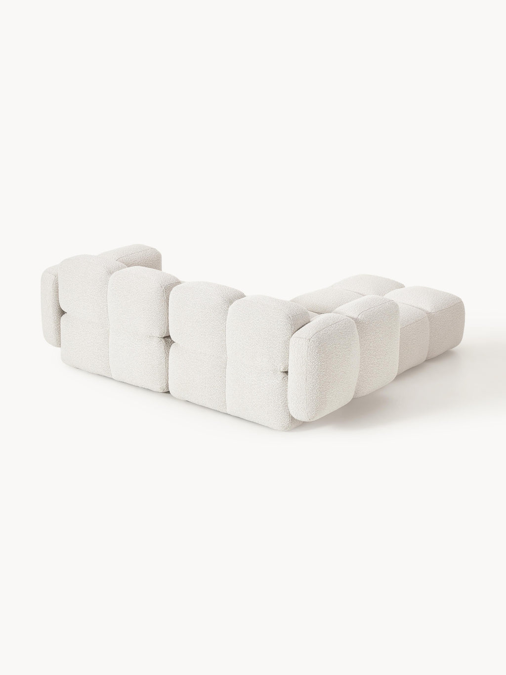Modulares Sofa Tayla (3-Sitzer) aus Bouclé mit Hocker (links/rechts)