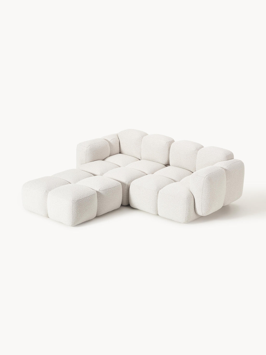 Modulares Sofa Tayla (3-Sitzer) aus Bouclé mit Hocker (links/rechts)