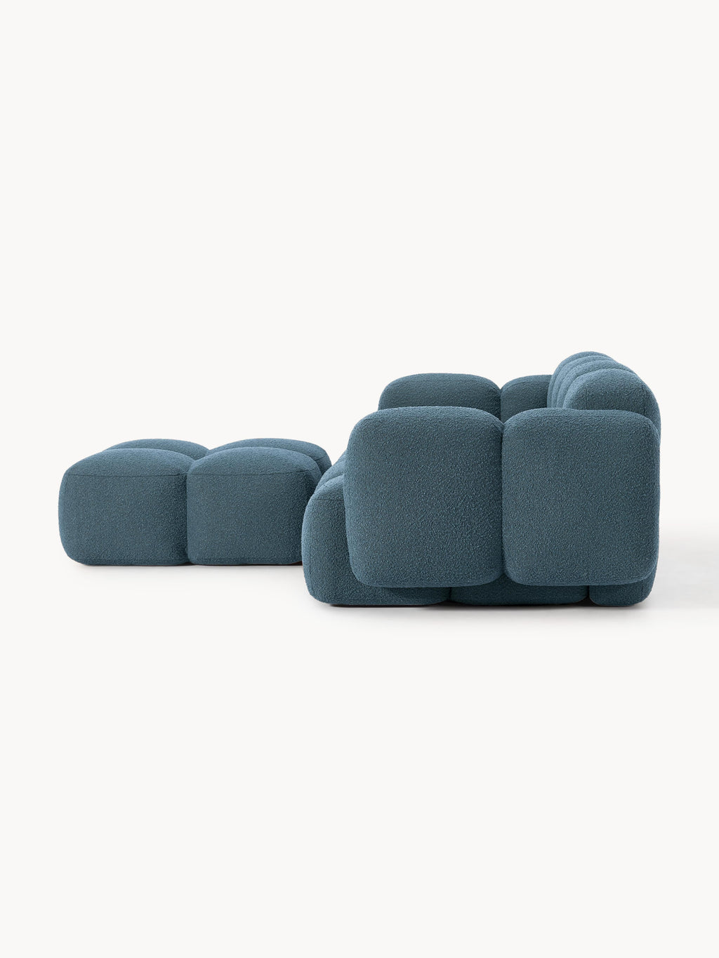 Modulares Sofa Tayla (3-Sitzer) aus Bouclé mit Hocker (links/rechts)