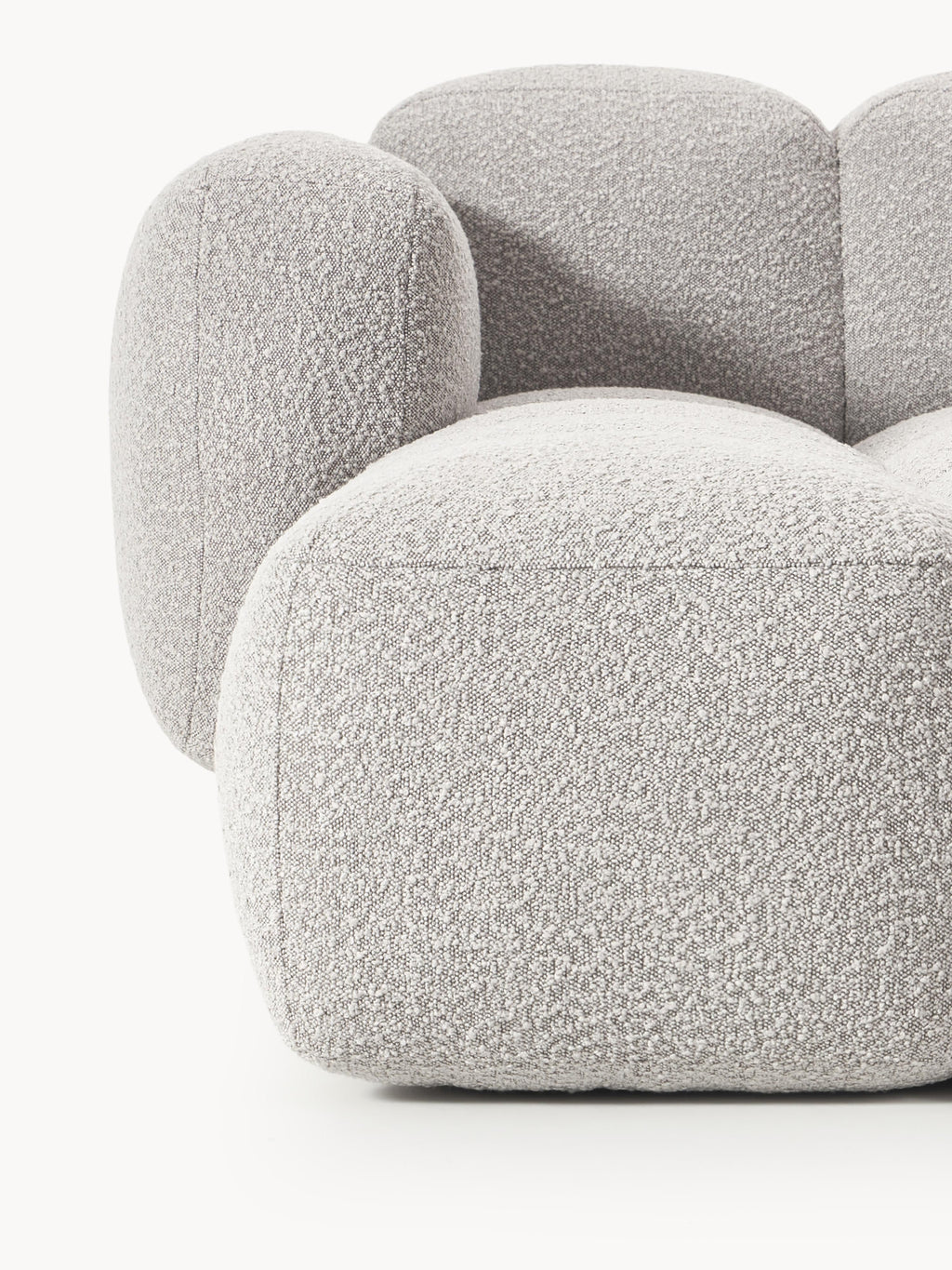 Modulares Sofa Tayla (4-Sitzer) aus Bouclé mit Hocker (links/rechts)