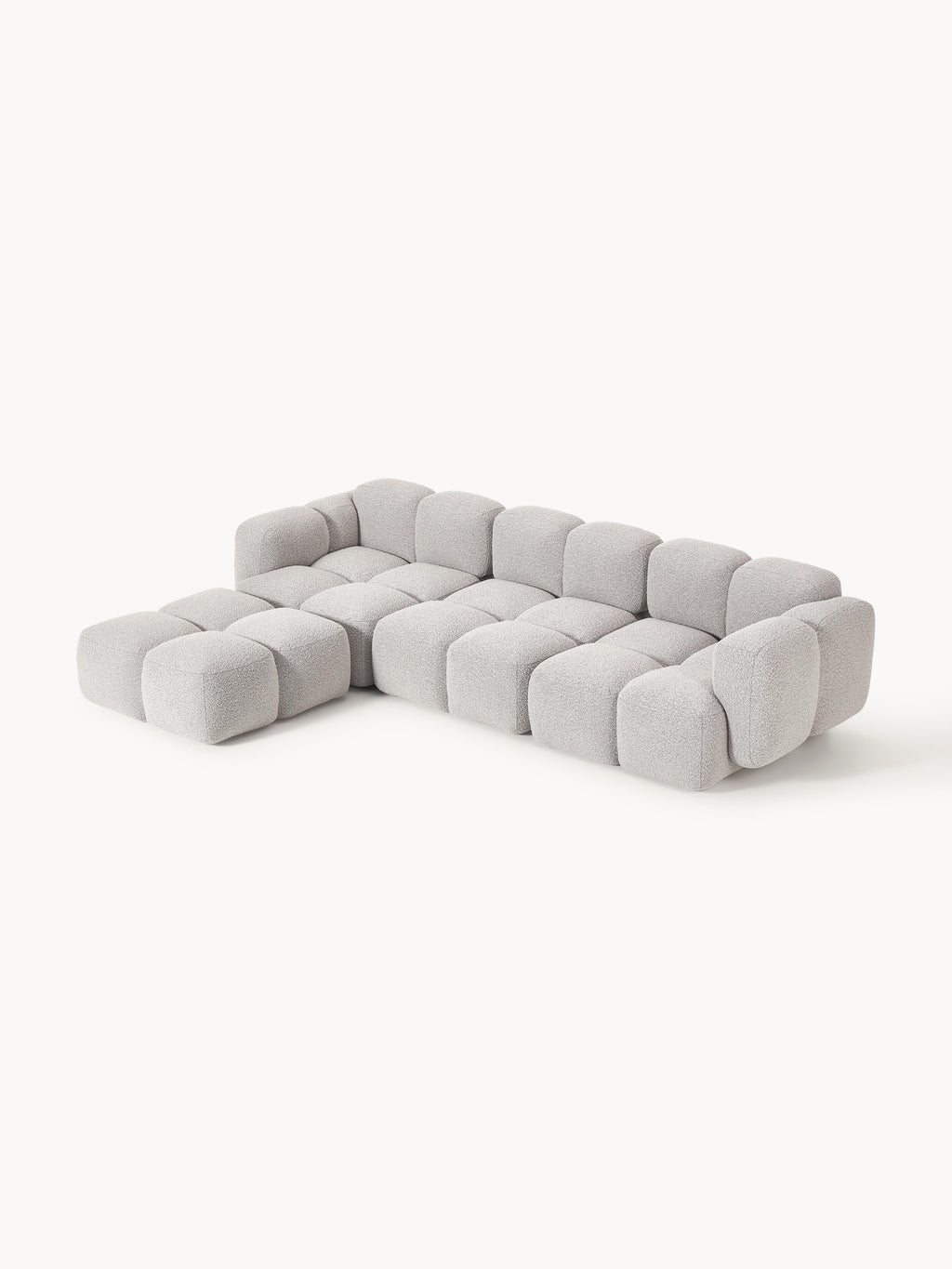 Modulares Sofa Tayla (4-Sitzer) aus Bouclé mit Hocker (links/rechts)