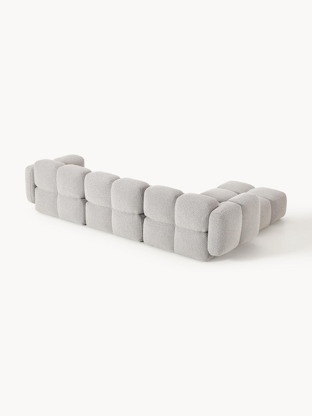 Modulares Sofa Tayla (4-Sitzer) aus Bouclé mit Hocker (links/rechts)