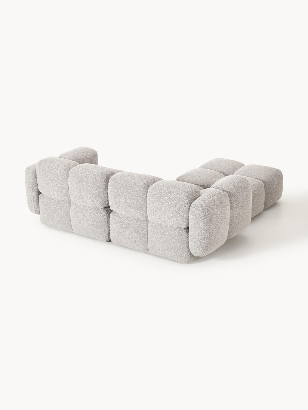 Modulares Sofa Tayla (3-Sitzer) aus Bouclé mit Hocker (links/rechts)