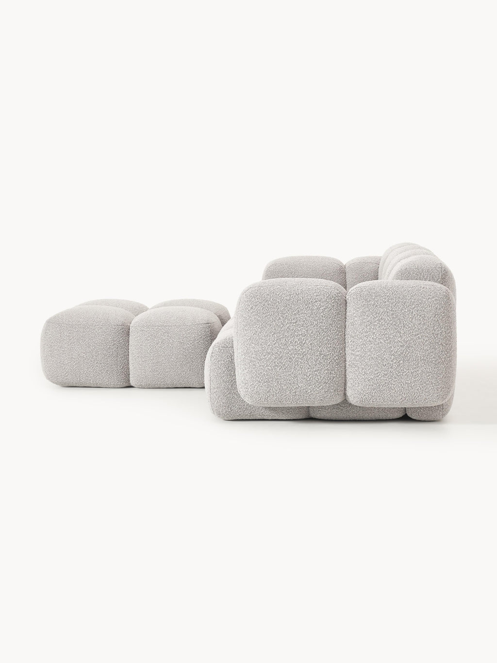 Modulares Sofa Tayla (3-Sitzer) aus Bouclé mit Hocker (links/rechts)