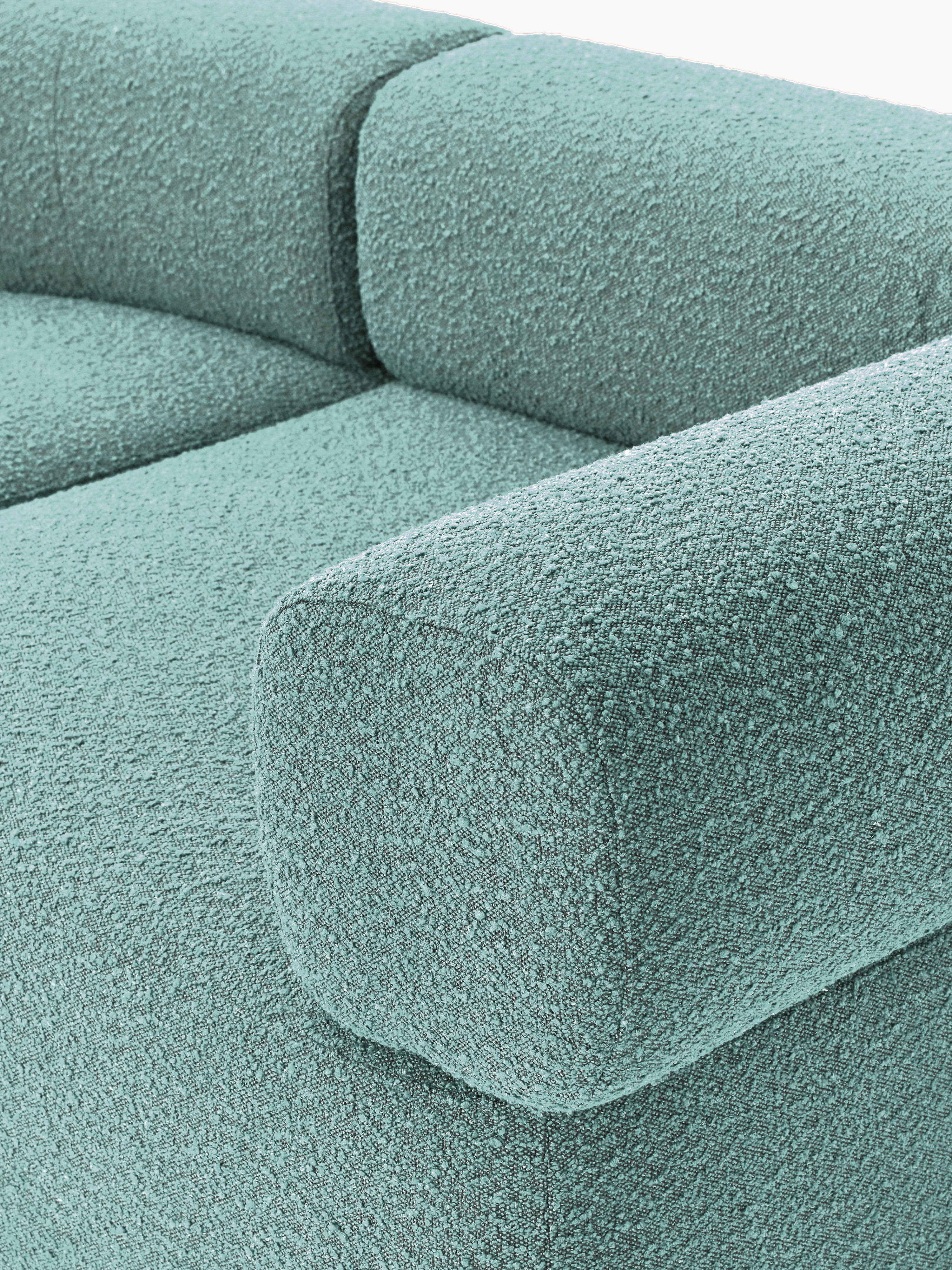 Großes modulares Bouclé-Sofa Anton mit Hocker (links/rechts)