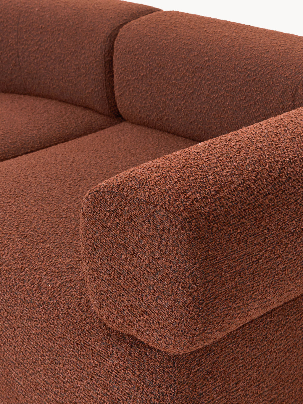 Großes modulares Bouclé-Sofa Anton mit Hocker (links/rechts)