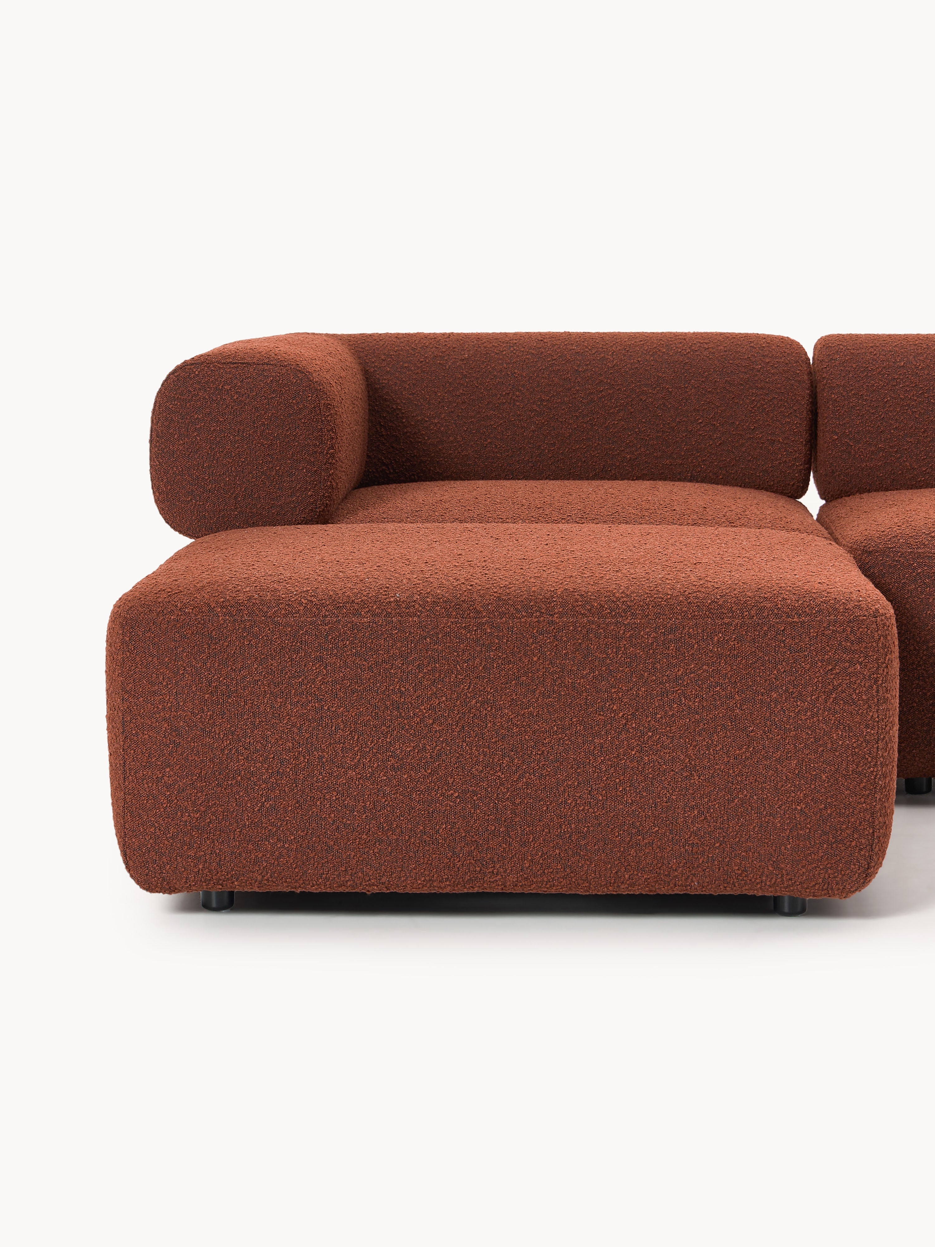 Großes modulares Bouclé-Sofa Anton mit Hocker (links/rechts)