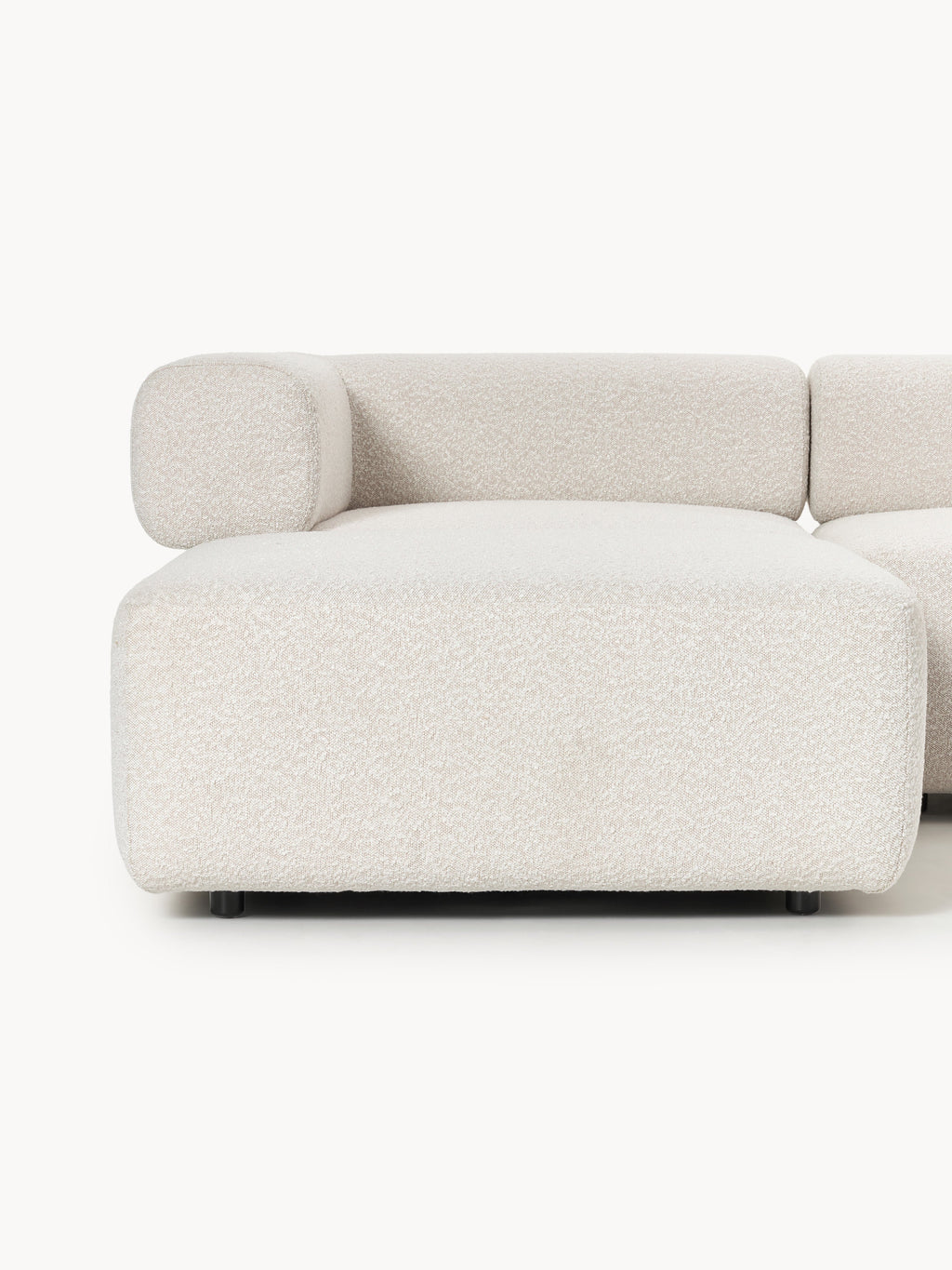 Großes modulares Bouclé-Sofa Anton mit Hocker (links/rechts)